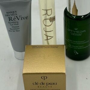Women's gift bag, Cleau de Peau, Orvida serum Roja perfume, Revive eye mask .